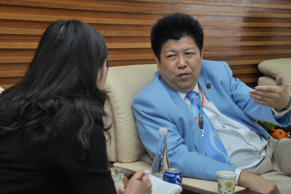 技术官员代表蓝松森向记者讲述他在广外场馆的感受