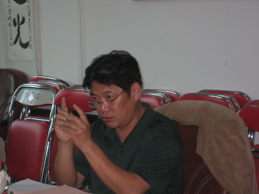 专家组组长王振华教授作总结发言