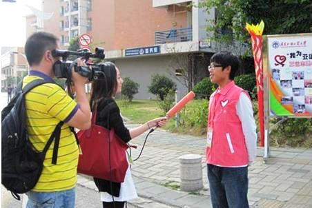 服务站工作人员表示很荣幸参与志愿工作